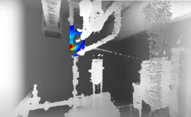 Depth point cloud of a room with a localised radiation hotspot shown in colour.